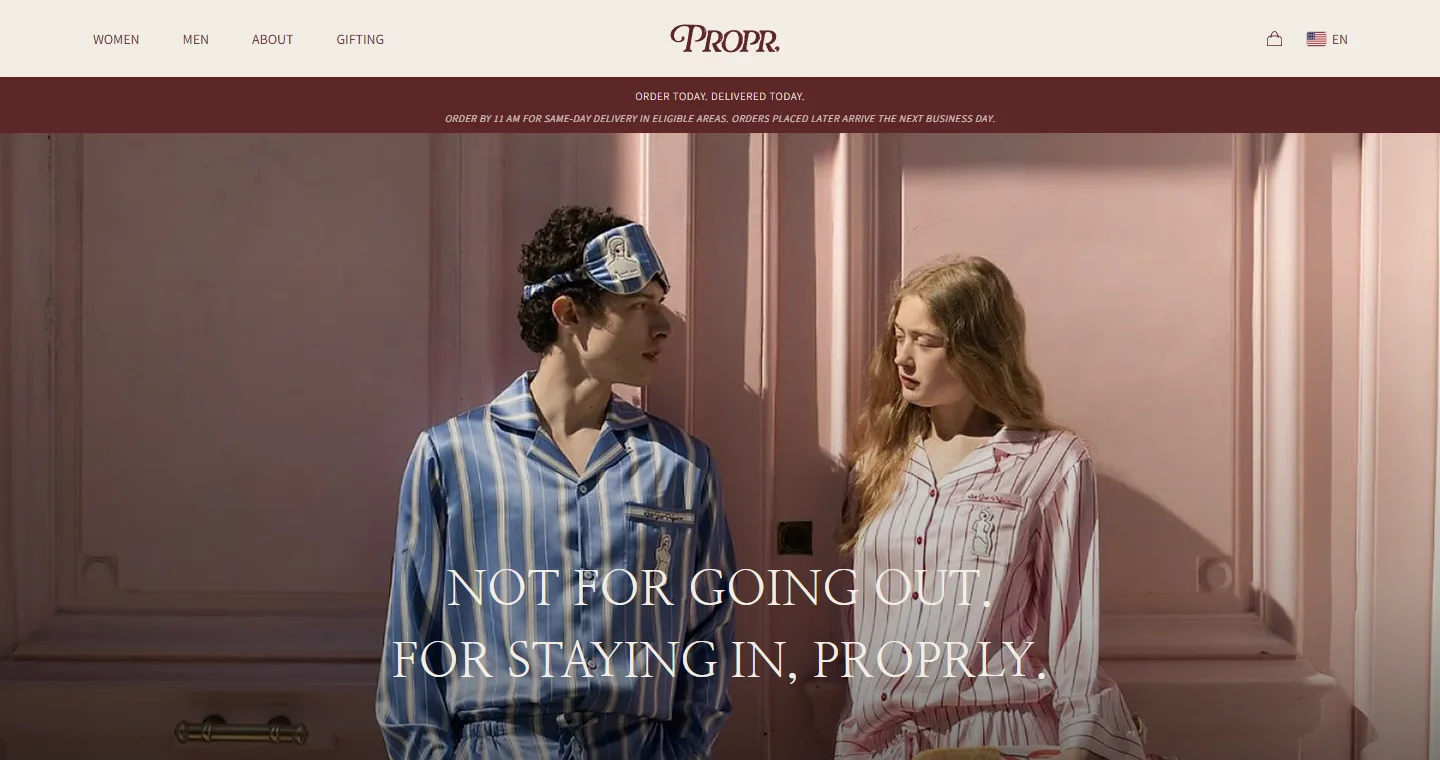 The PROPR home page — a couple in striped pajamas, an announcement bar with the same-day delivery promise and the women, men, about and gifting menu